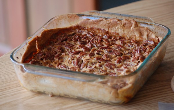 Pecan pie baked in a 13 inch square pan. square pie